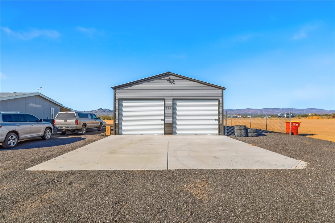 429 South Lochiel Road Golden Valley, AZ 86413 - Photo 6 of 61 Detached garage featuring a mountain view