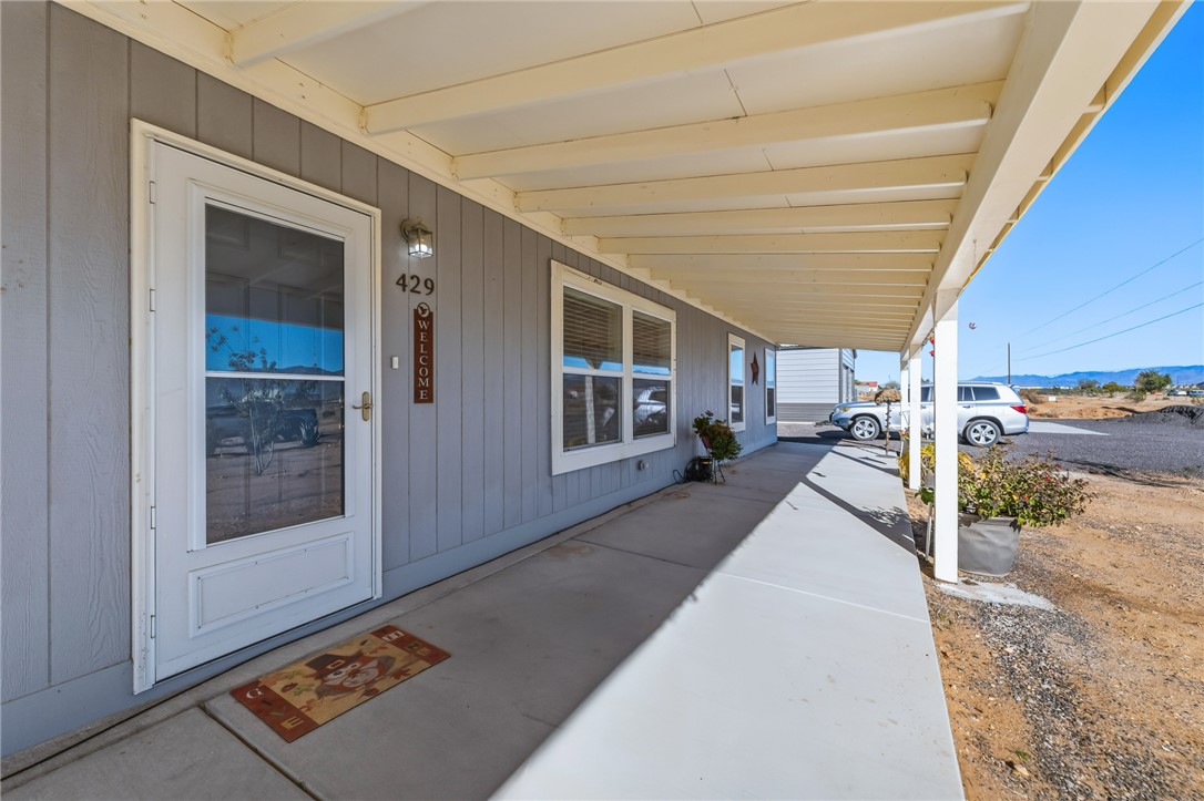 429 South Lochiel Road Golden Valley, AZ 86413 - Photo 10 of 61 View of covered front porch