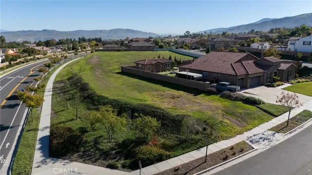 a view of a lake with a yard