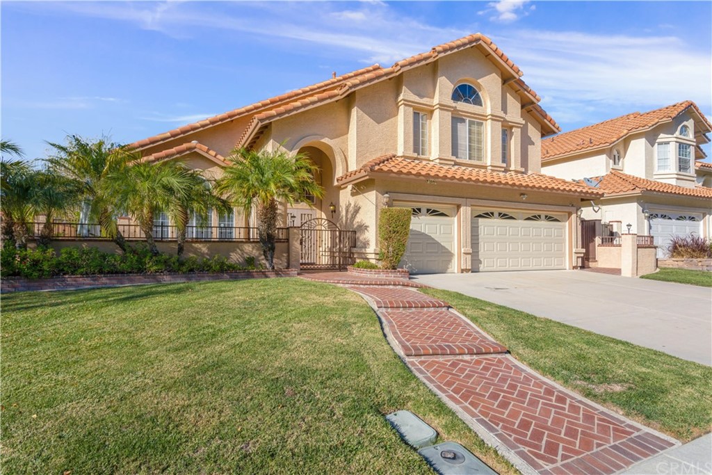 31594 Paseo Goleta Temecula, CA 92592 - Photo 1 of 1 a front view of a house with garden