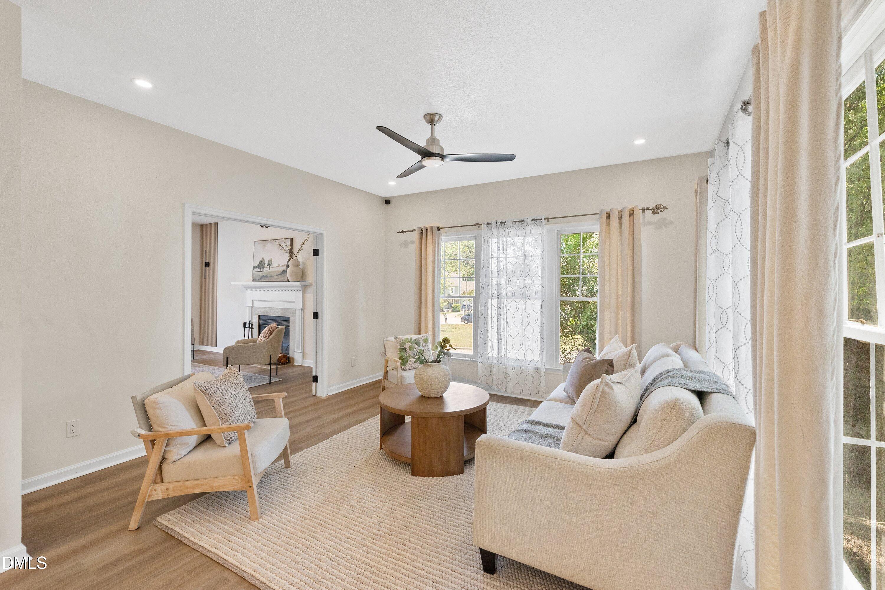 2517 Birchford Court Raleigh, NC 27604 - Photo 17 of 63 a living room with furniture and a large window