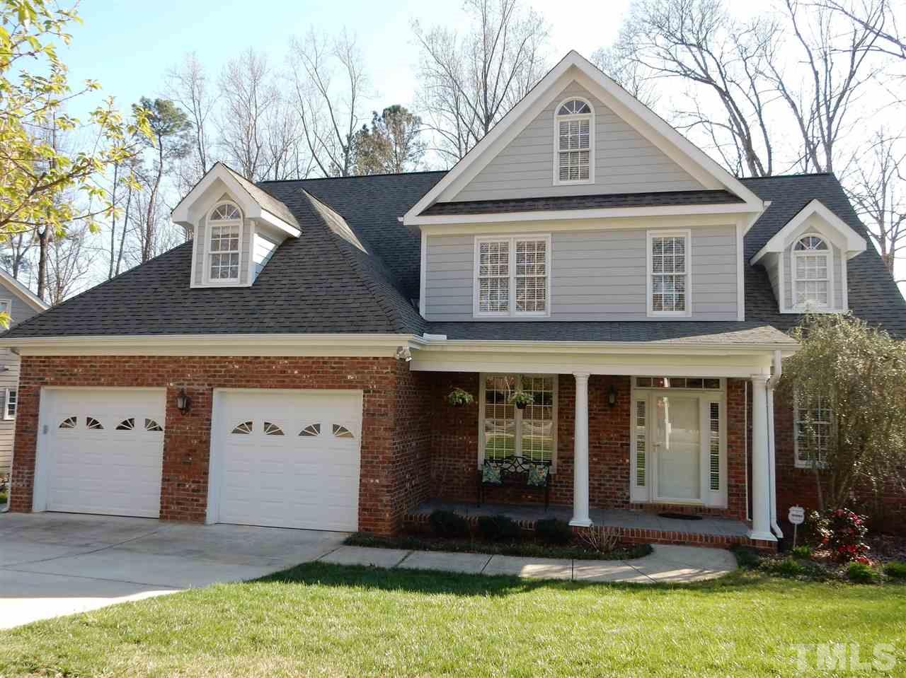 3201 Ringland Road Raleigh, NC 27613 - Photo 1 of 25 a front view of a house with a yard