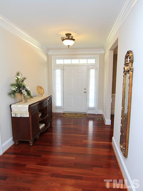 3201 Ringland Road Raleigh, NC 27613 - Photo 2 of 25 a room with wooden floor and window