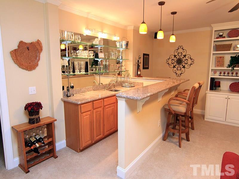 3201 Ringland Road Raleigh, NC 27613 - Photo 19 of 25 a room with a table and chairs