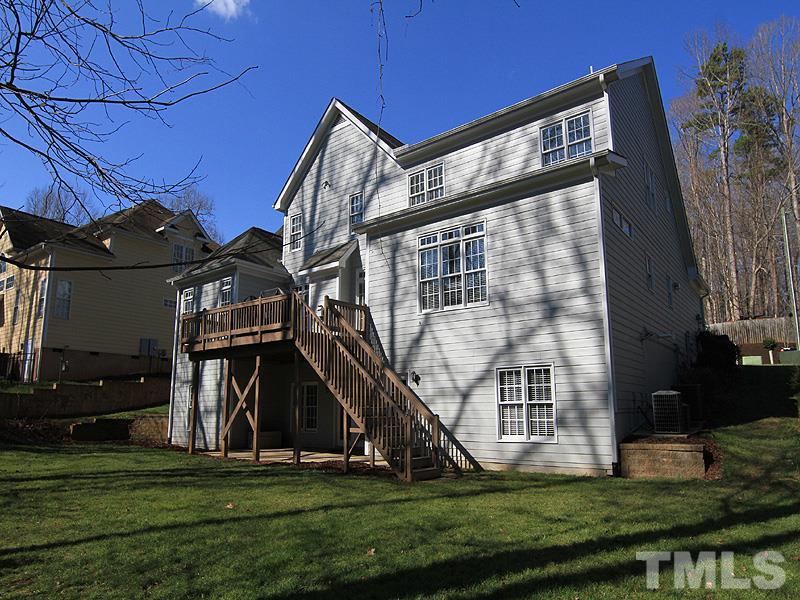 3201 Ringland Road Raleigh, NC 27613 - Photo 25 of 25 a view of a house with a yard