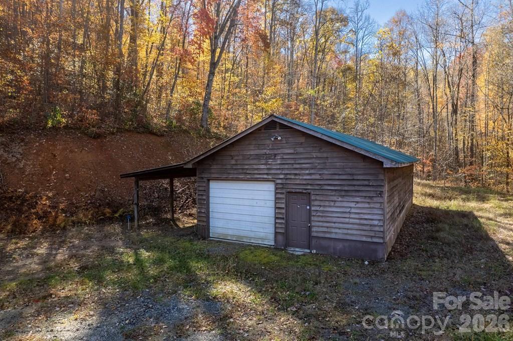 930 Copperhead Cove Road Sylva, NC 28779 - Photo 13 of 18 a view of barn with a small yard