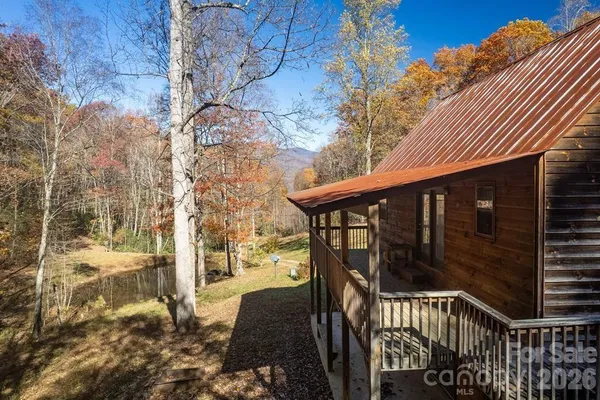 a view of balcony with wooden floor