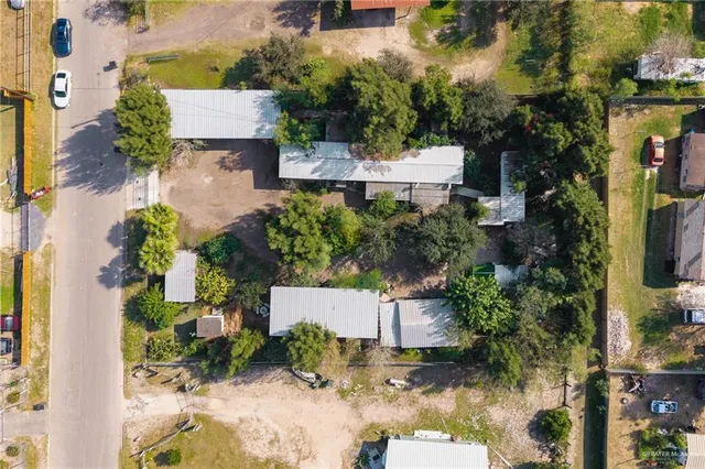 an aerial view of residential house with outdoor space
