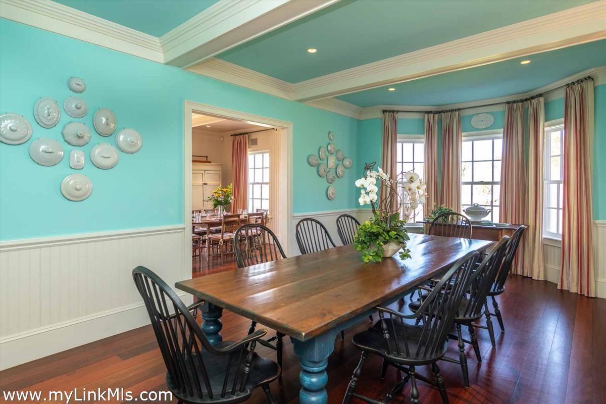25 Lelands Path Edgartown, MA 02539 - Photo 15 of 56 a view of a dining room with furniture window and wooden floor