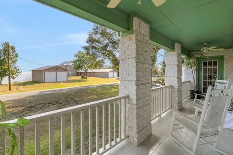 a view of a balcony with lake view