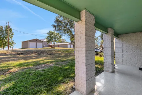 a view of a house with a swimming pool