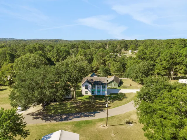 a view of a lake with a garden