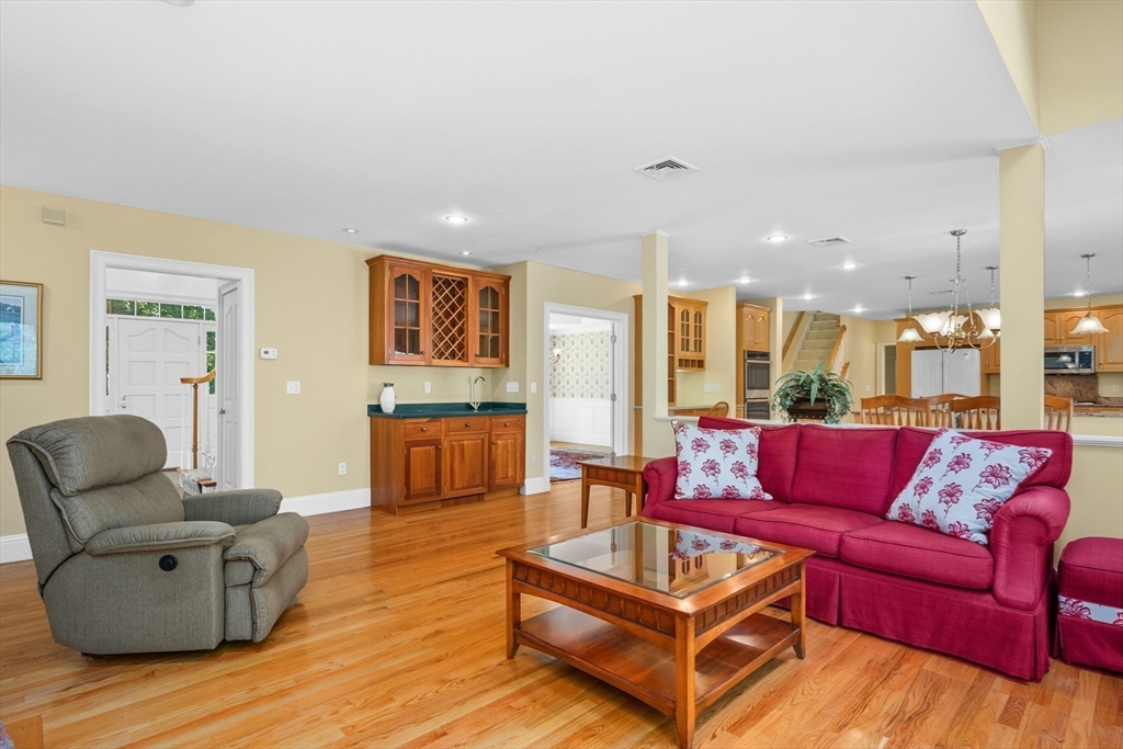 6 Match Point Dennis, MA 02638 - Photo 13 of 42 a living room with furniture and a wooden floor