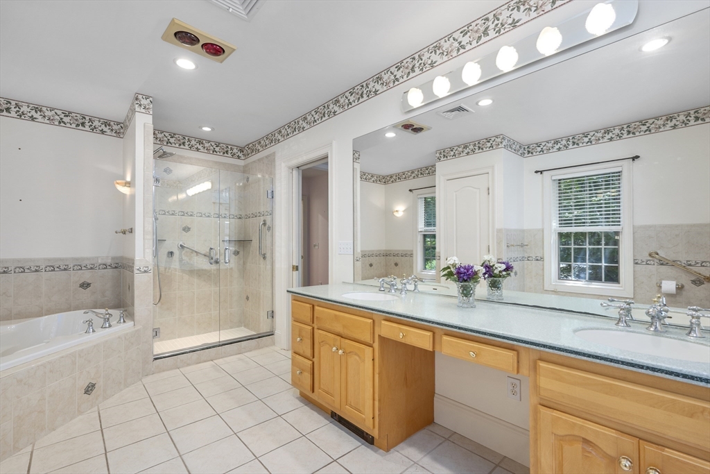 6 Match Point Dennis, MA 02638 - Photo 18 of 42 a spacious bathroom with a tub sink shower and mirror