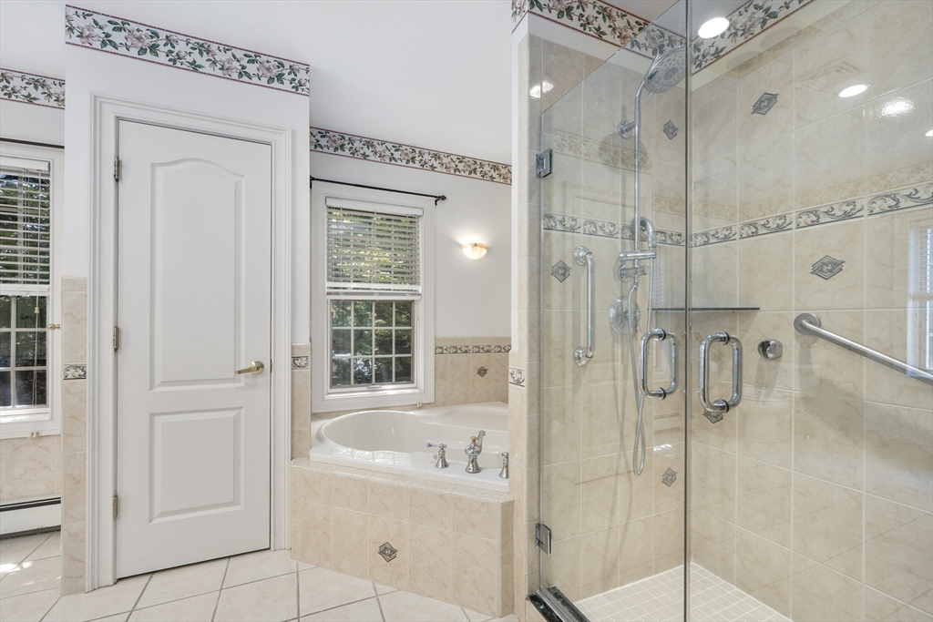 6 Match Point Dennis, MA 02638 - Photo 19 of 42 a bathroom with a bathtub and a shower