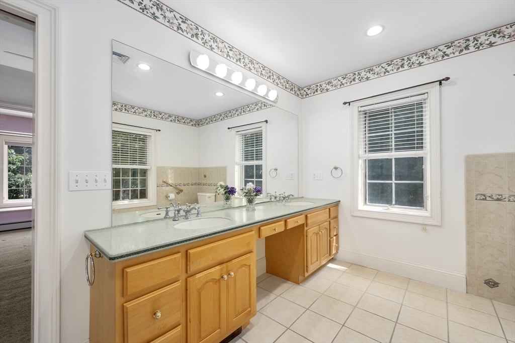 6 Match Point Dennis, MA 02638 - Photo 20 of 42 a bathroom with a sink double vanity and a mirror