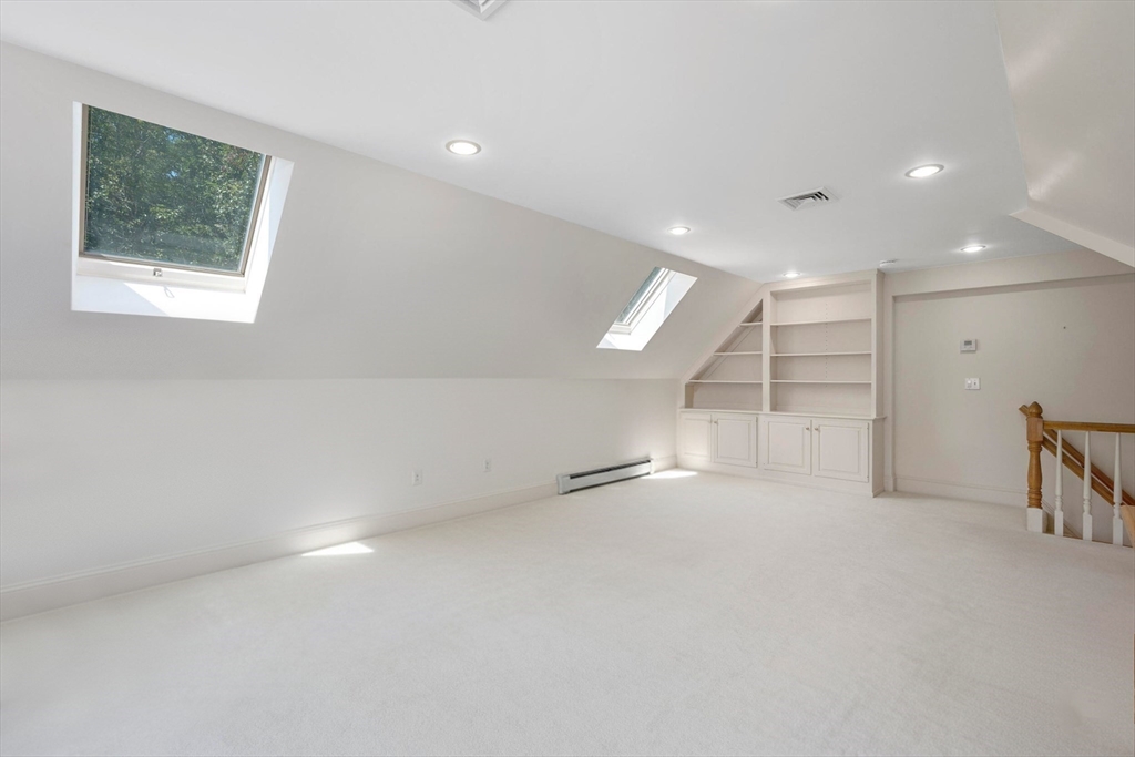 6 Match Point Dennis, MA 02638 - Photo 29 of 42 an empty room with a empty space and windows