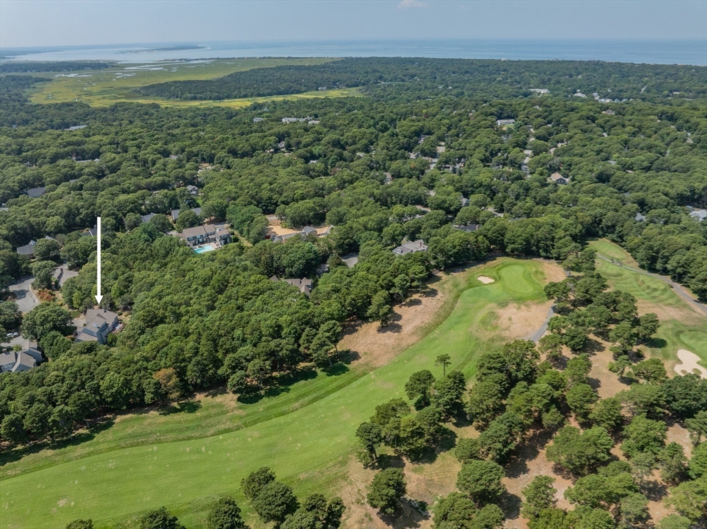 6 Match Point Dennis, MA 02638 - Photo 36 of 42 a view of a field with an ocean