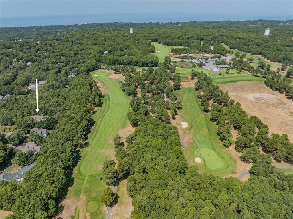 6 Match Point Dennis, MA 02638 - Photo 38 of 42 an aerial view of residential houses with outdoor space and trees