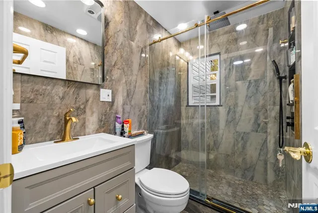 a view of a storage & utility room with washer and dryer