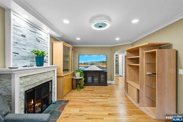 a kitchen with stainless steel appliances a refrigerator and a stove top oven