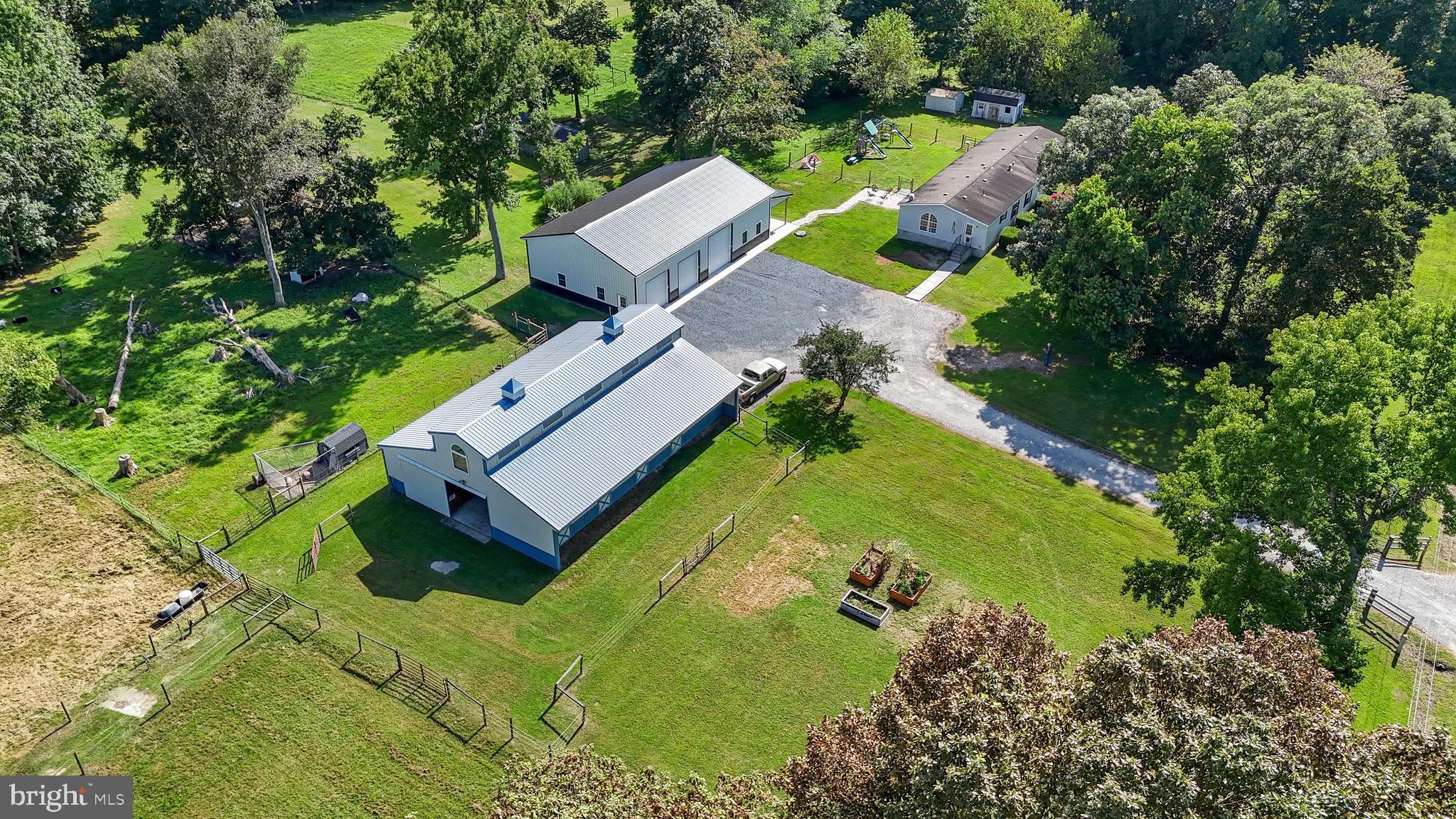 440 Indian Runner Road Felton, DE 19943 - Photo 1 of 50 an aerial view of a house