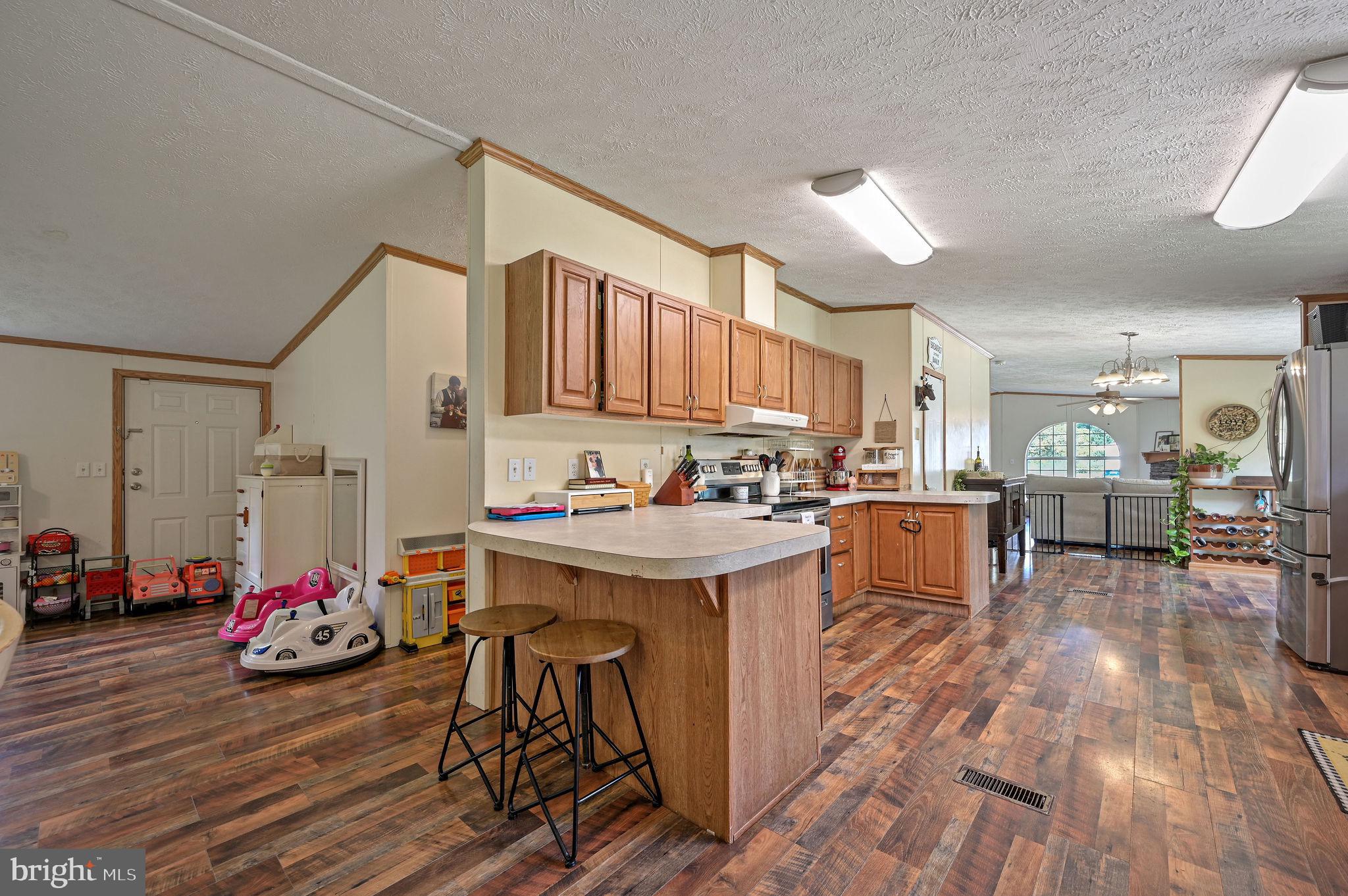 440 Indian Runner Road Felton, DE 19943 - Photo 26 of 50 a view of a kitchen and dining room
