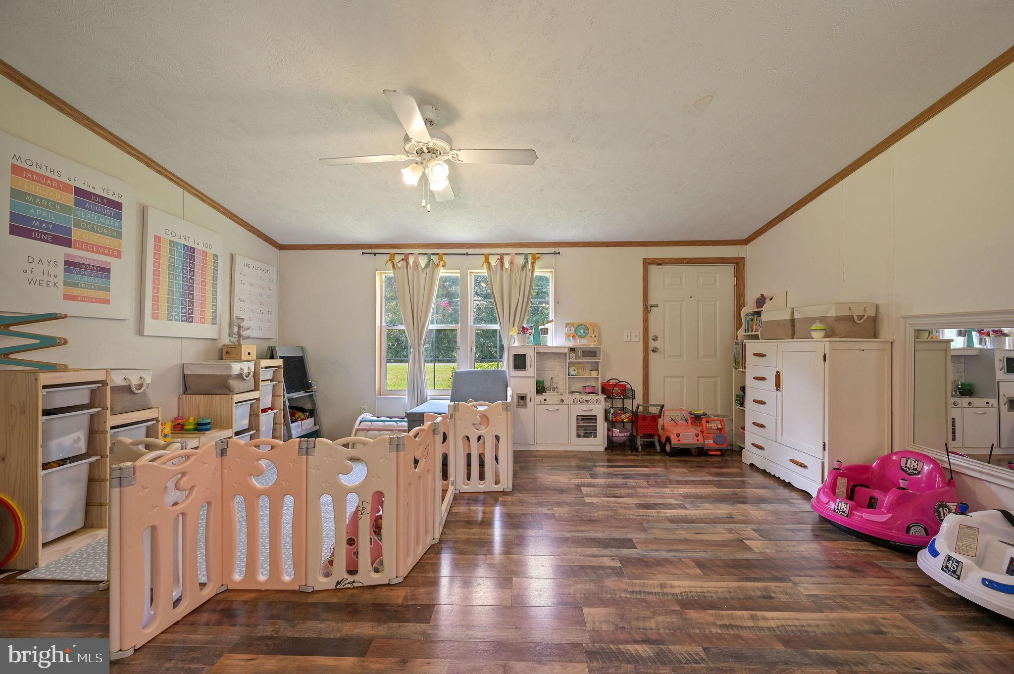 440 Indian Runner Road Felton, DE 19943 - Photo 27 of 50 a living room with furniture and wooden floor