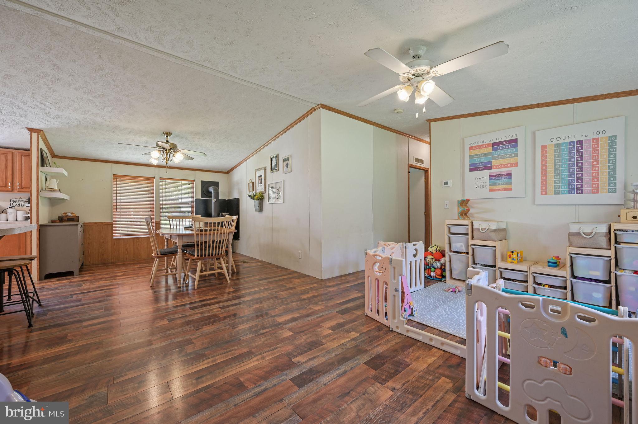 440 Indian Runner Road Felton, DE 19943 - Photo 28 of 50 a view of a livingroom with furniture and a work space