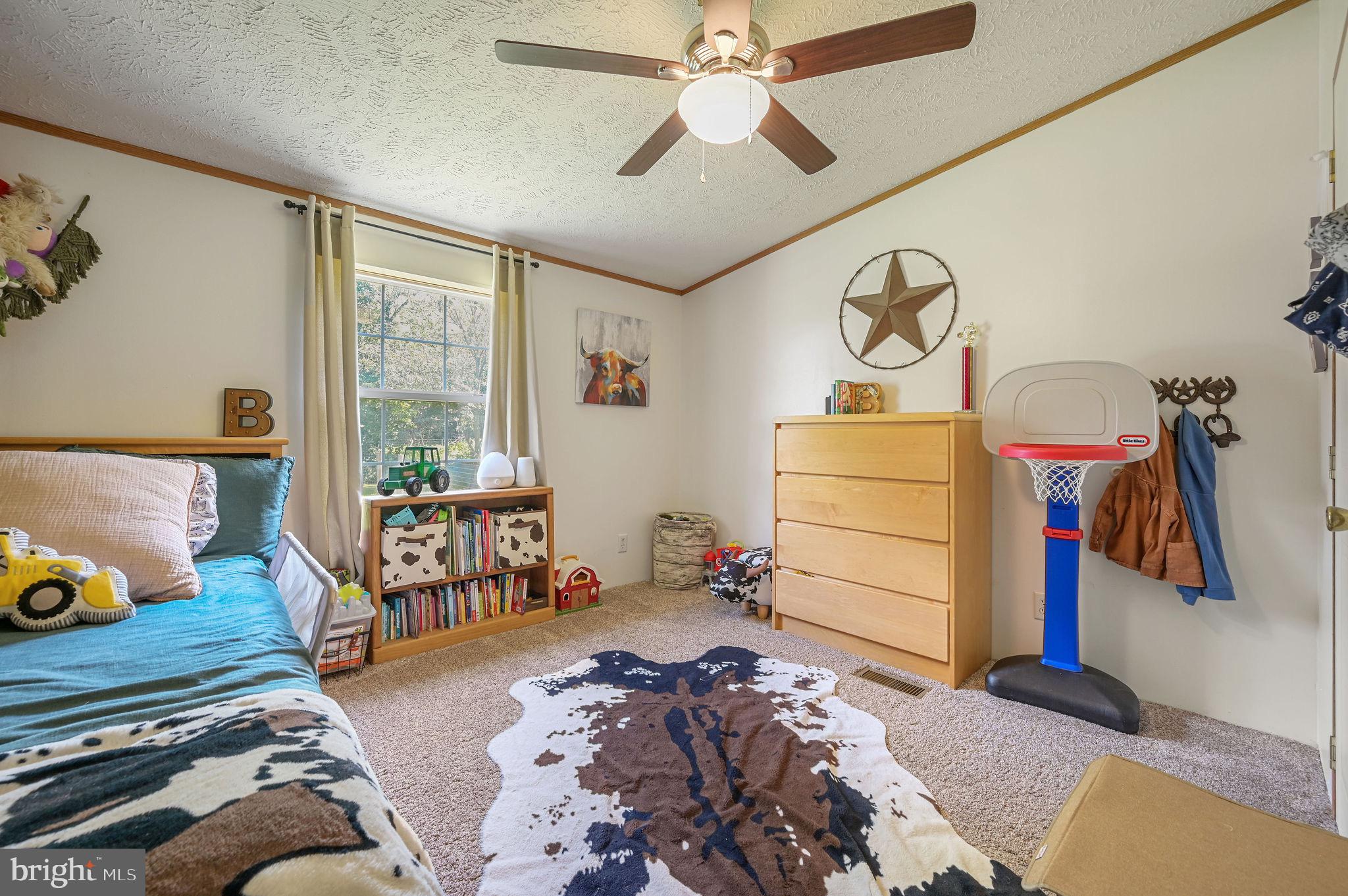 440 Indian Runner Road Felton, DE 19943 - Photo 35 of 50 a bedroom with furniture and a window