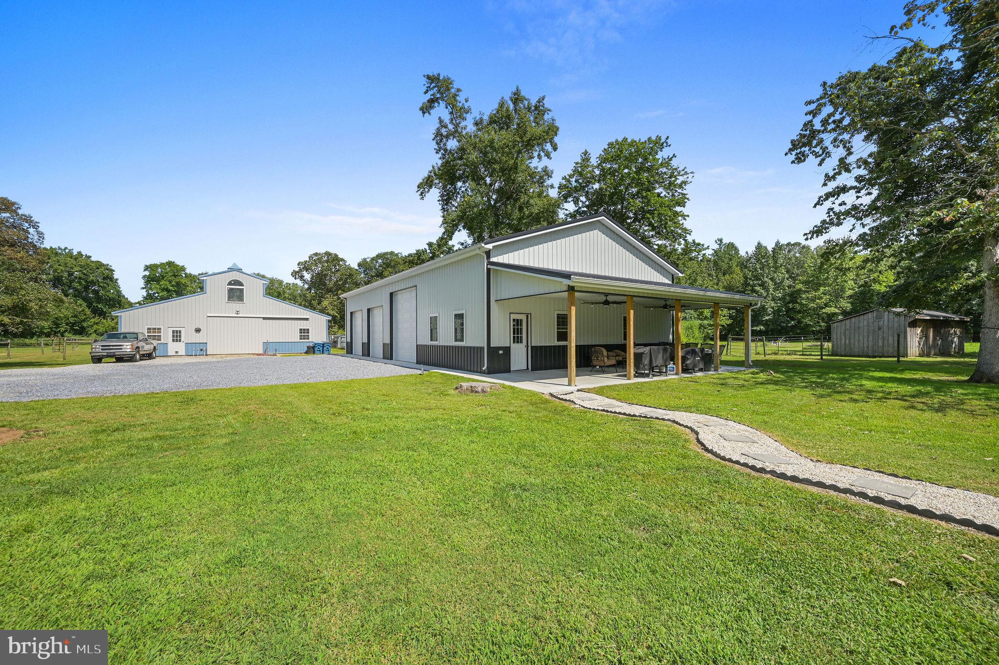 440 Indian Runner Road Felton, DE 19943 - Photo 9 of 50 a front view of a house with a yard