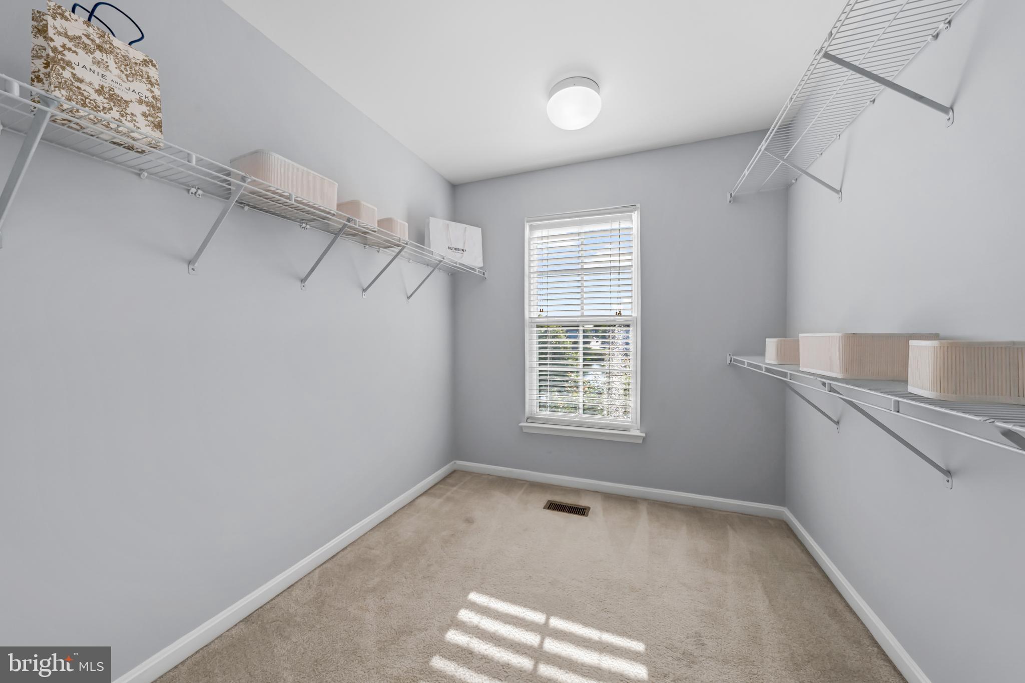 9231 Ribbon Falls Loop Bristow, VA 20136 - Photo 24 of 40 a view of an empty room with a window