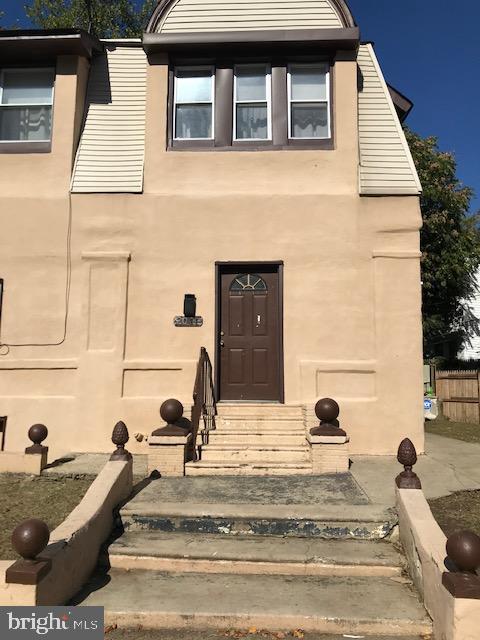 2011 Stenton Avenue, Unit A Philadelphia, PA 19138 - Photo 1 of 20 a view of a house with a backyard and a tub