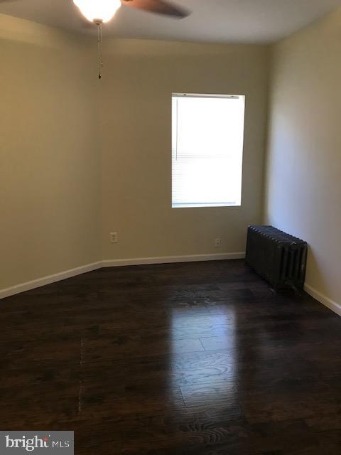 2011 Stenton Avenue, Unit A Philadelphia, PA 19138 - Photo 12 of 20 a view of room with wooden floor and windows
