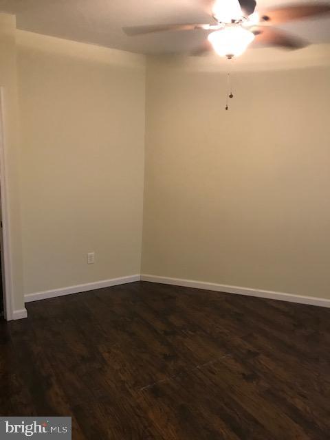 2011 Stenton Avenue, Unit A Philadelphia, PA 19138 - Photo 13 of 20 a view of an empty room with wooden floor