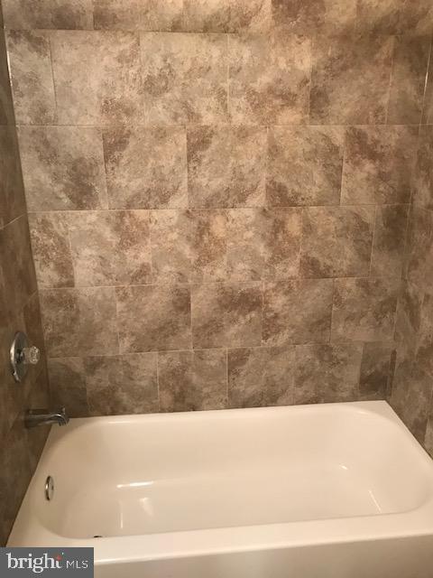 2011 Stenton Avenue, Unit A Philadelphia, PA 19138 - Photo 17 of 20 a view of a bathtub in a bathroom