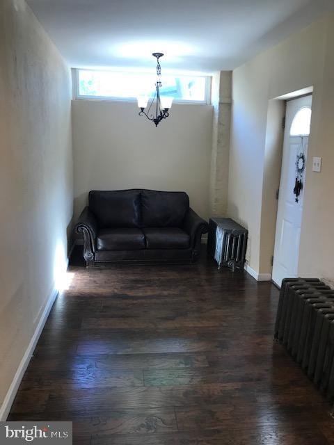 2011 Stenton Avenue, Unit A Philadelphia, PA 19138 - Photo 4 of 20 a living room with furniture and a flat screen tv