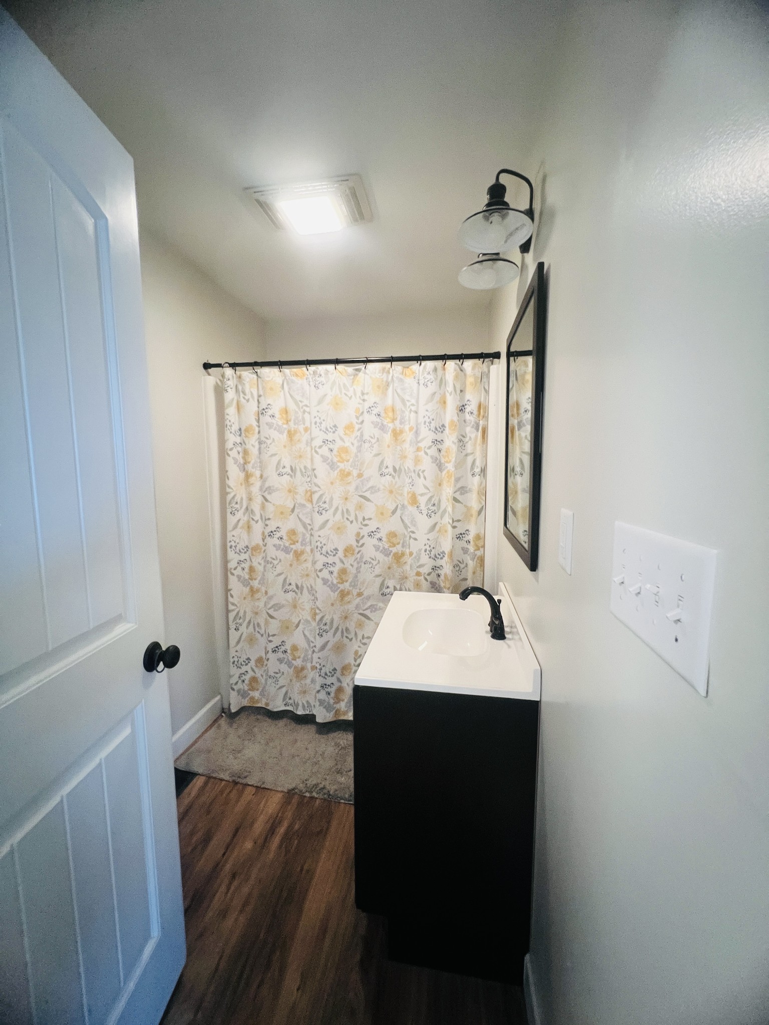 100 Locust Street Alexandria, TN 37012 - Photo 11 of 21 a bathroom with a sink a toilet and shower