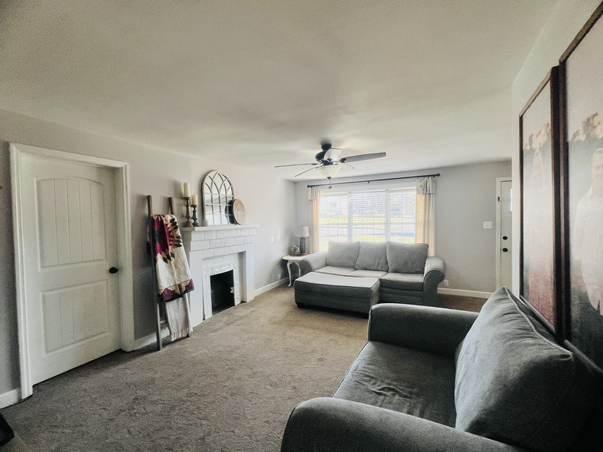 100 Locust Street Alexandria, TN 37012 - Photo 7 of 21 a living room with furniture and a fireplace
