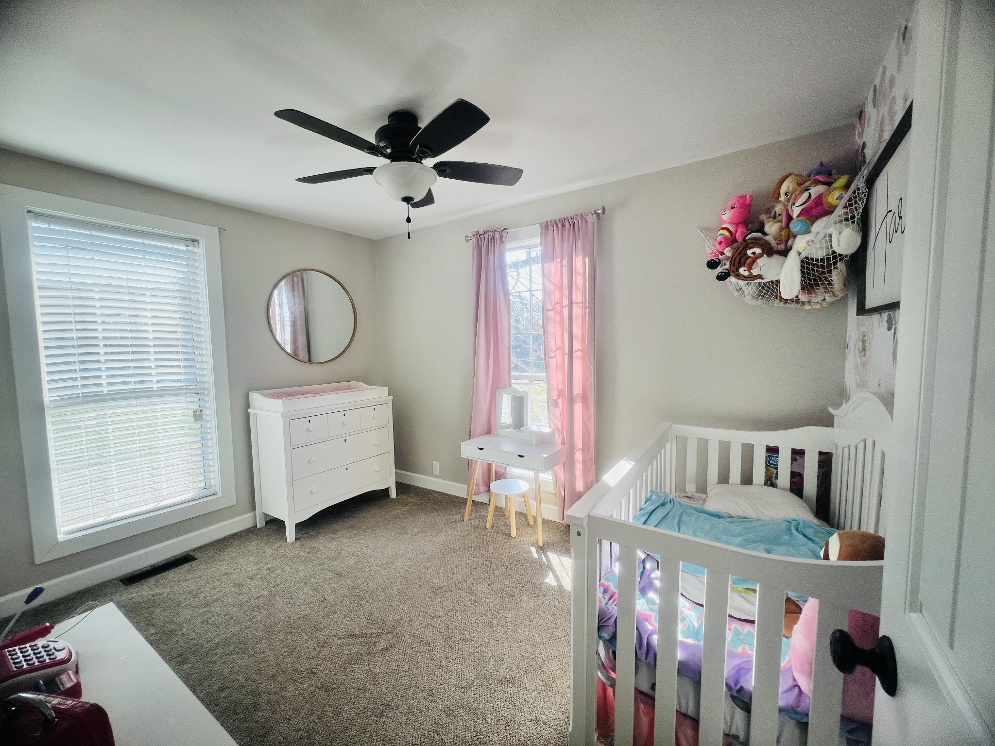 100 Locust Street Alexandria, TN 37012 - Photo 9 of 21 a bedroom with furniture and a window