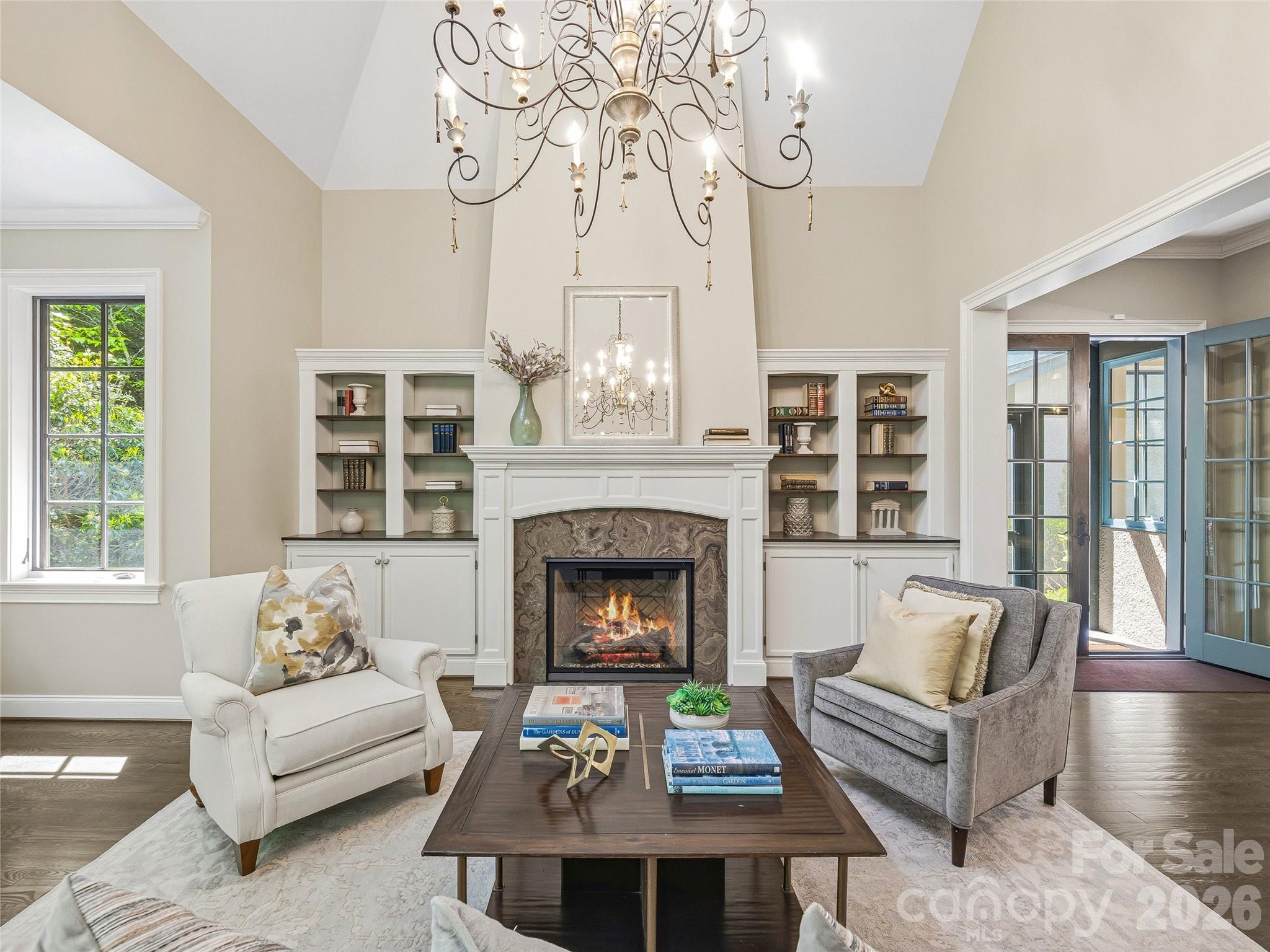 732 Streamside Drive Arden, NC 28704 - Photo 11 of 46 a living room with furniture and a fireplace