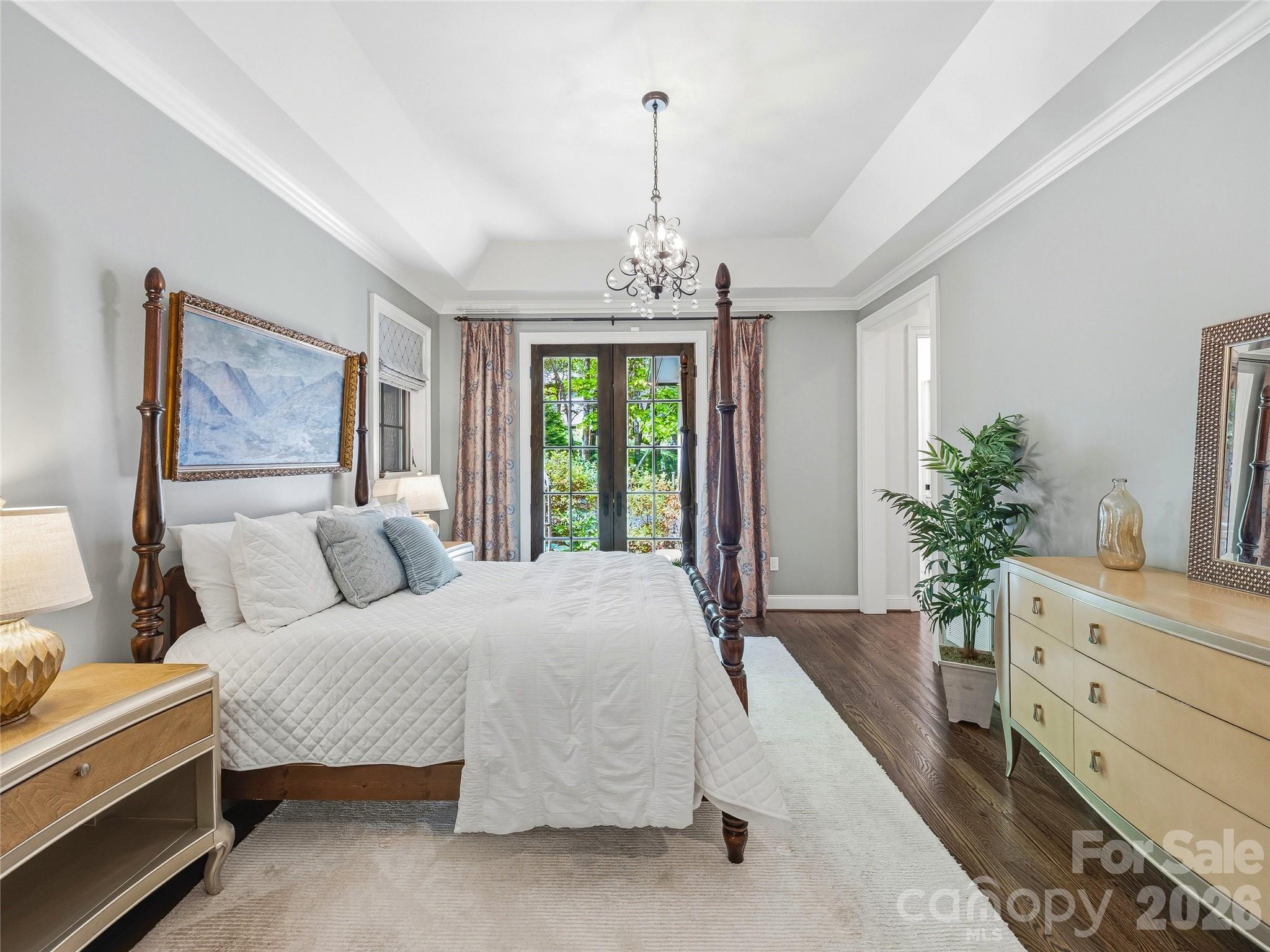 732 Streamside Drive Arden, NC 28704 - Photo 23 of 46 a bedroom with a large bed and a window