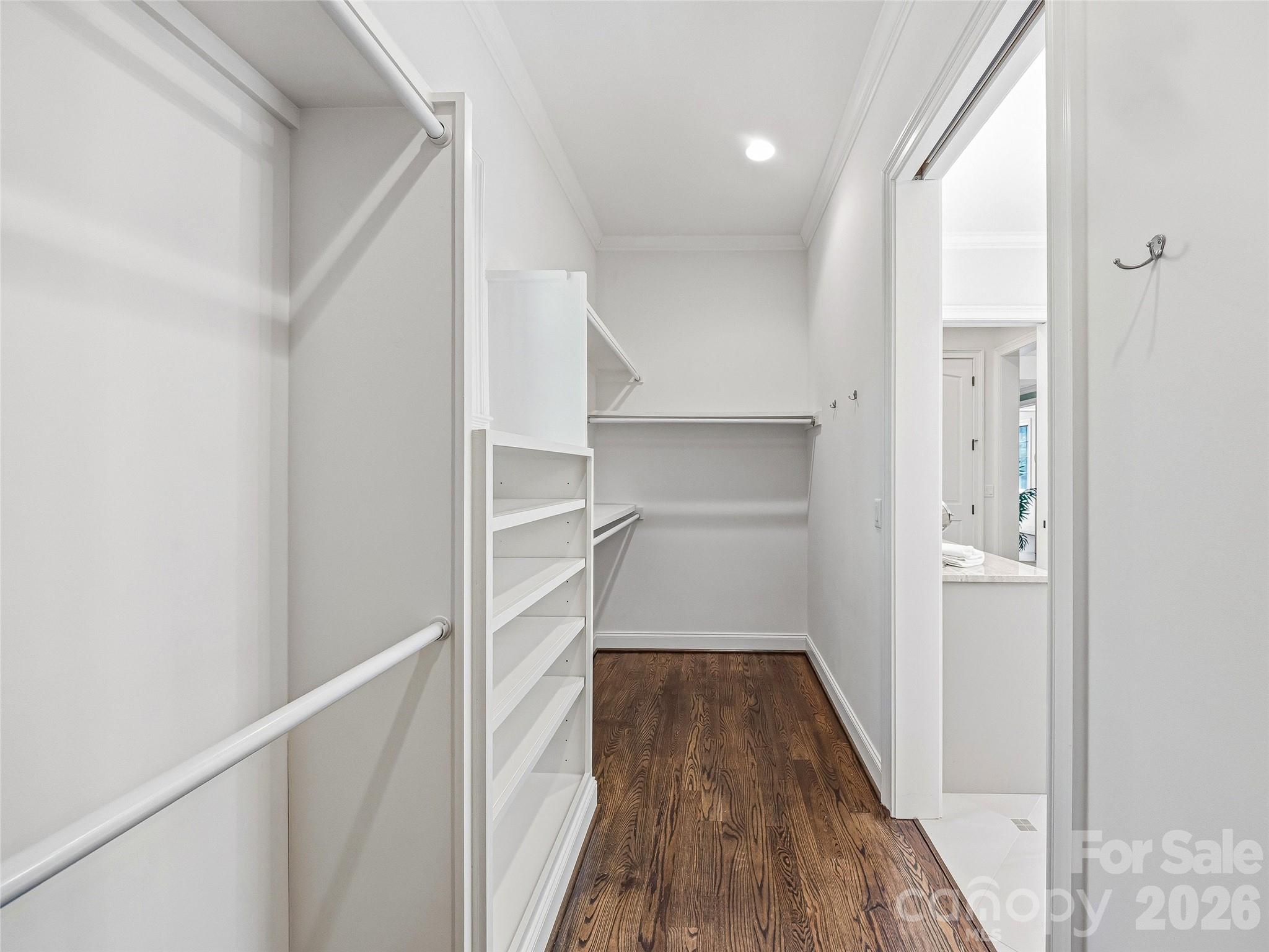 732 Streamside Drive Arden, NC 28704 - Photo 28 of 46 a view of a hallway with wooden floor and entryway