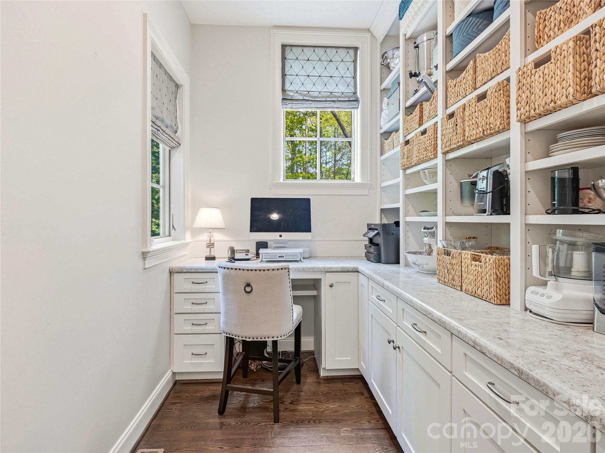 732 Streamside Drive Arden, NC 28704 - Photo 29 of 46 a view of a workspace with furniture and a window