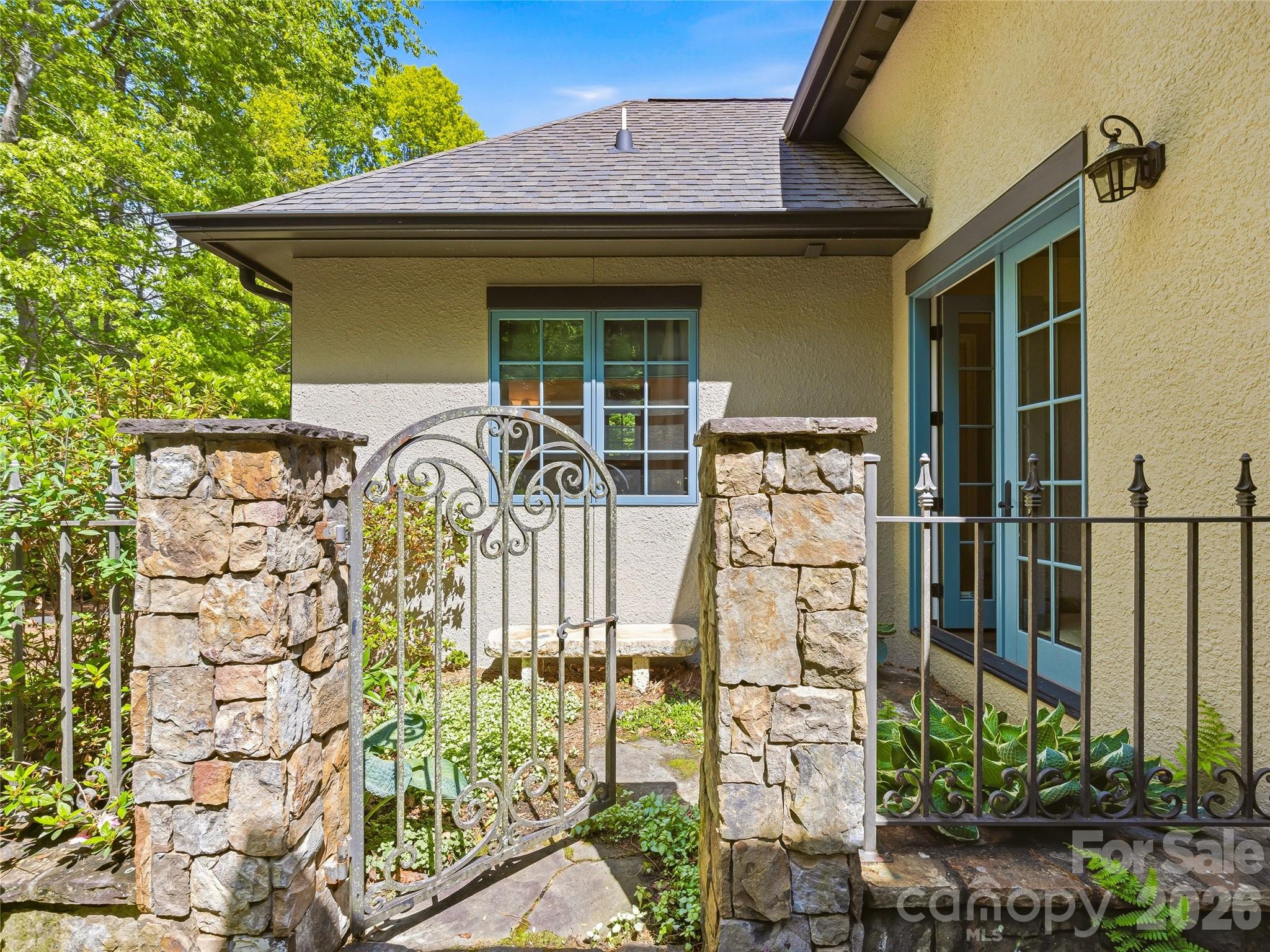 732 Streamside Drive Arden, NC 28704 - Photo 40 of 46 a front view of a house with glass door