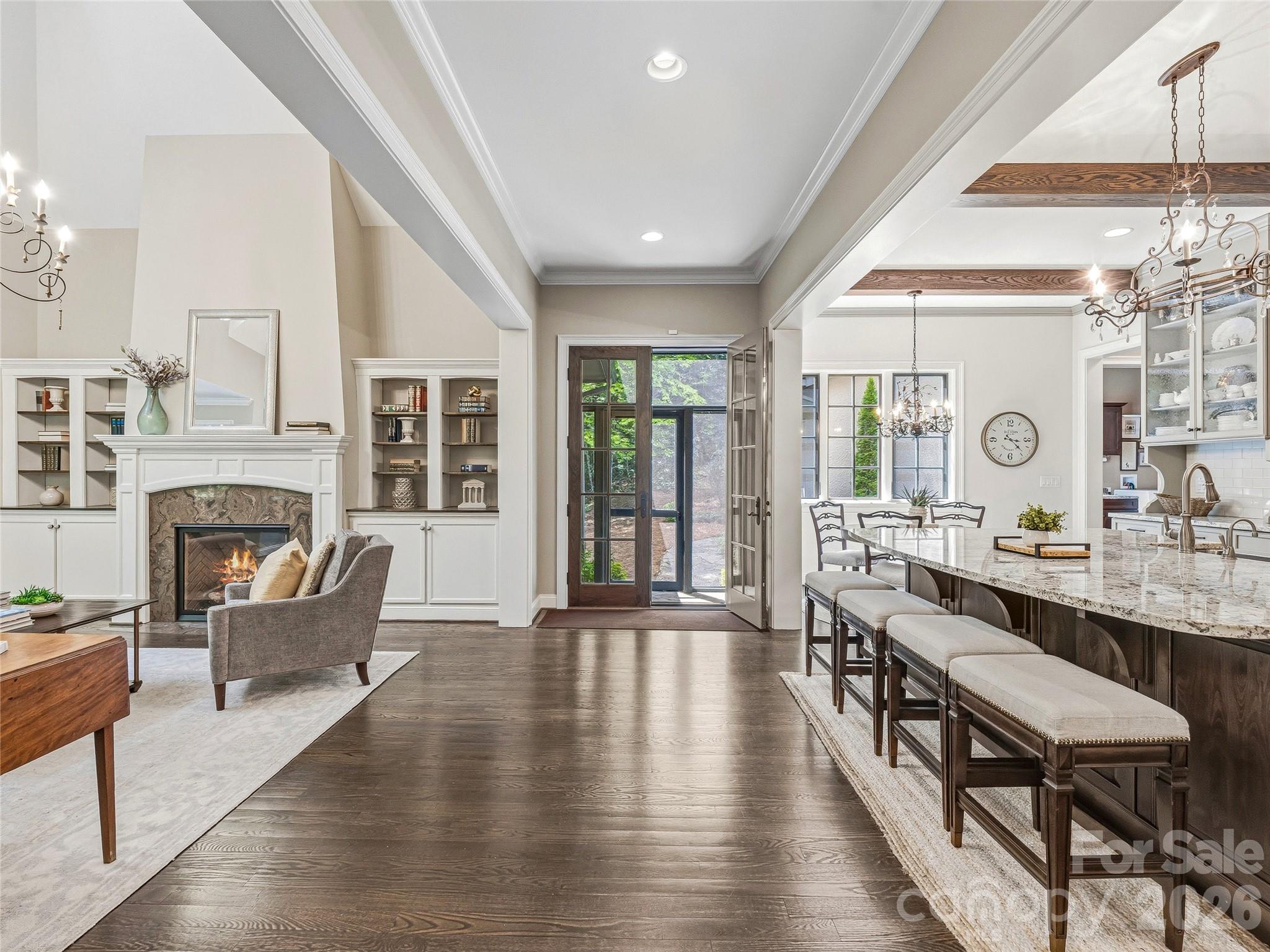 732 Streamside Drive Arden, NC 28704 - Photo 5 of 46 a living room with fireplace furniture and a wooden floor