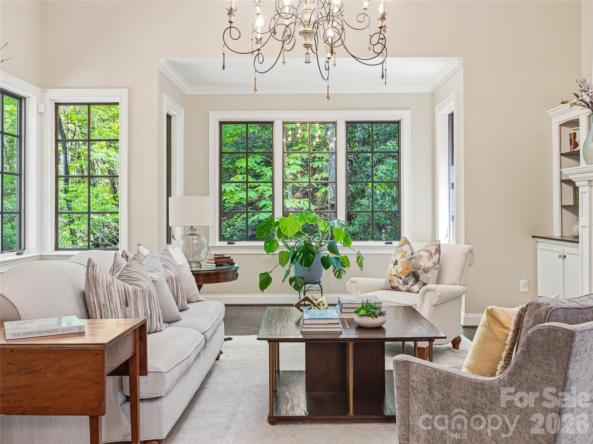 732 Streamside Drive Arden, NC 28704 - Photo 7 of 46 a living room with furniture and a large window