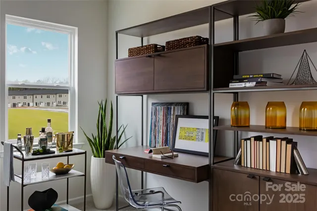 a front view of a house with lots of wooden furniture