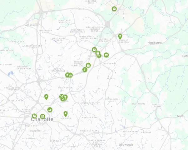 a bathroom with a sink mirror and shower