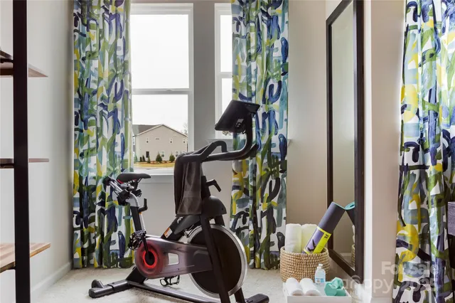 a view of a room with gym equipment